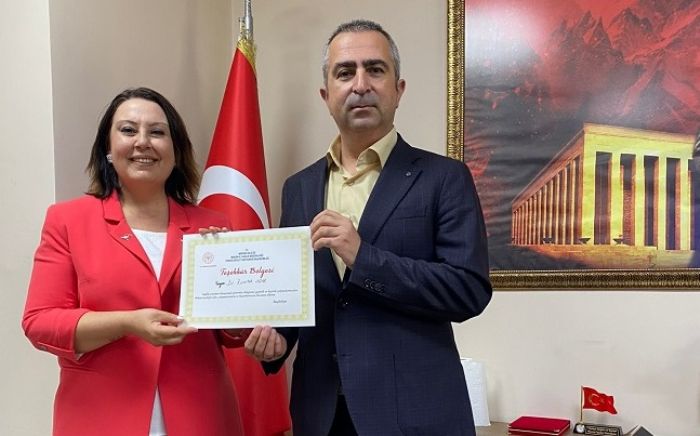 DR. RUHSAR U�AR�A TE�EKK�R BELGES� 